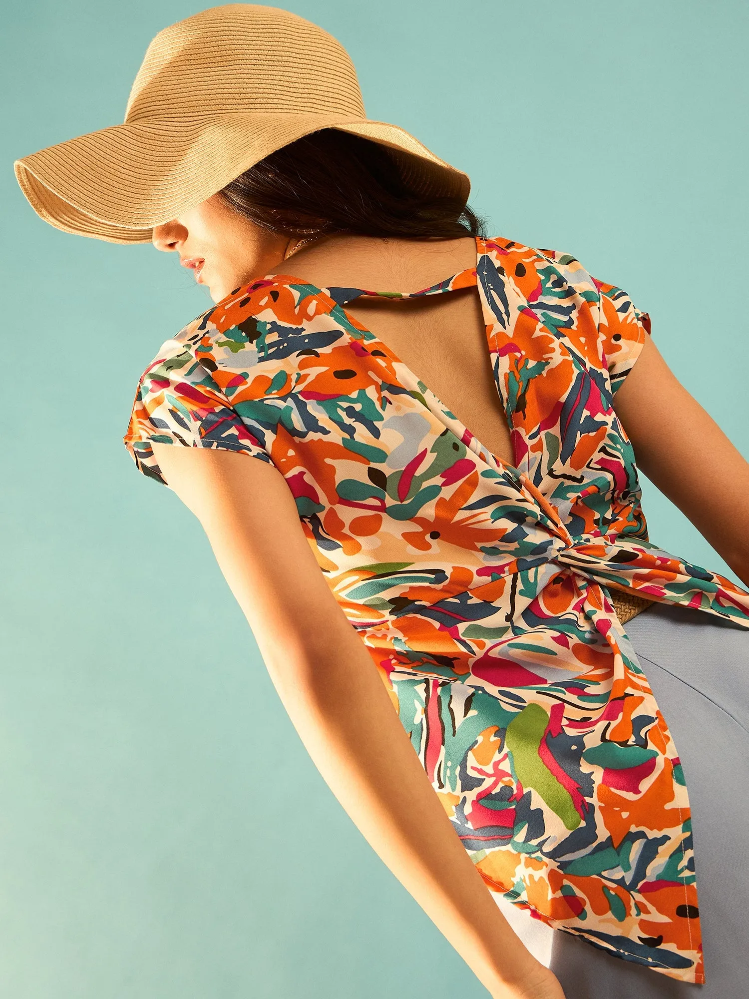 Berrylush Women White & Multicolour Abstract Printed Round Neck Twisted Cutout Back Regular Top